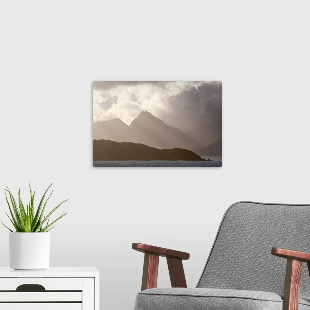 A modern room featuring Mountains and clouds on the coast of South Georgia