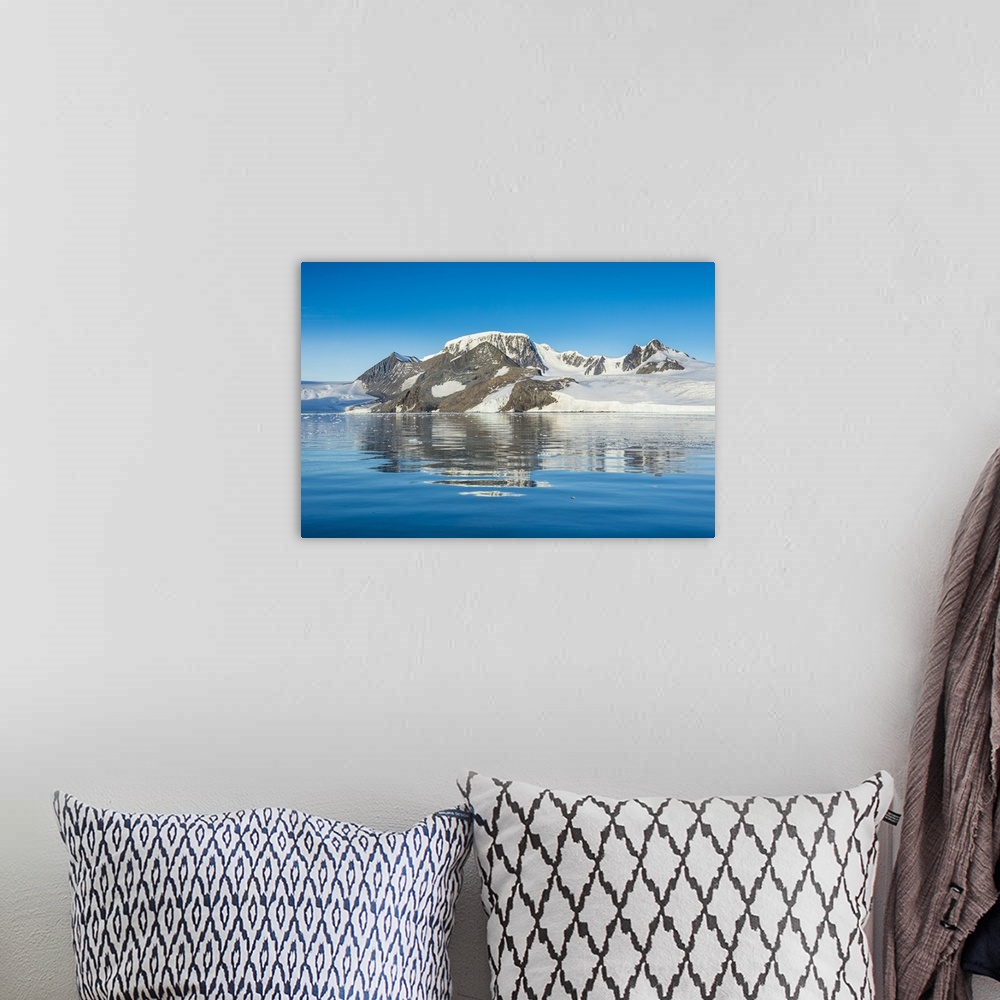 A bohemian room featuring Mountains reflecting in glassy water of Hope Bay, Antarctica, Polar Regions