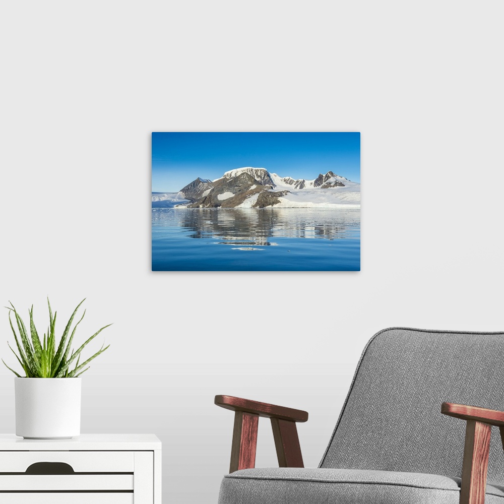 A modern room featuring Mountains reflecting in glassy water of Hope Bay, Antarctica, Polar Regions