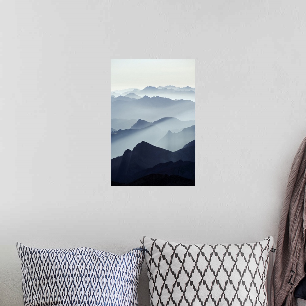 A bohemian room featuring Mountains silhouetted at sunrise, view from Pico de Aneto, at 3404m the highest peak in the Pyren...