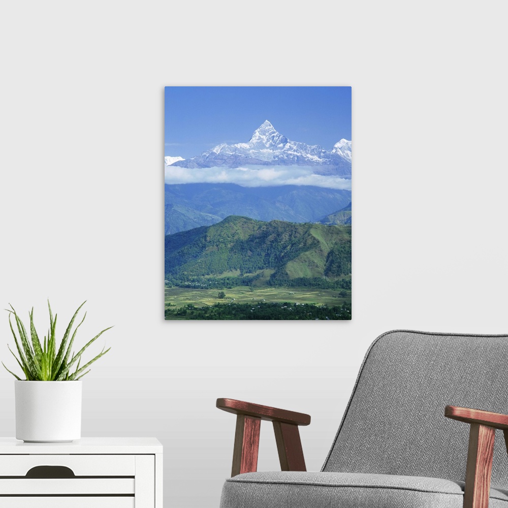 A modern room featuring Mt Machhapuchhare (Machapuchare) (Fish Tail), the Himalayas, Nepal