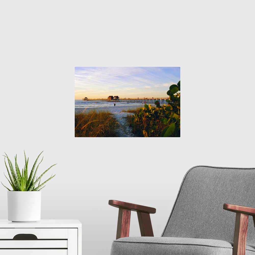 A modern room featuring Naples, Florida, Sunset at the beach and pier