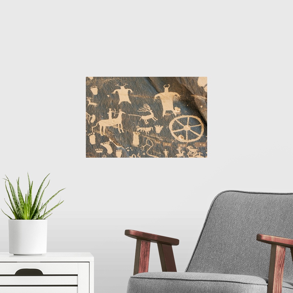 A modern room featuring Newspaper Rock, petroglyph panel etched in sandstone, Utah