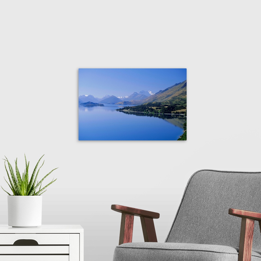 A modern room featuring Looking towards the northern tip of Lake Wakatipu at Glenorchy and Mt. Earnslaw, 2819m, beyond, w...
