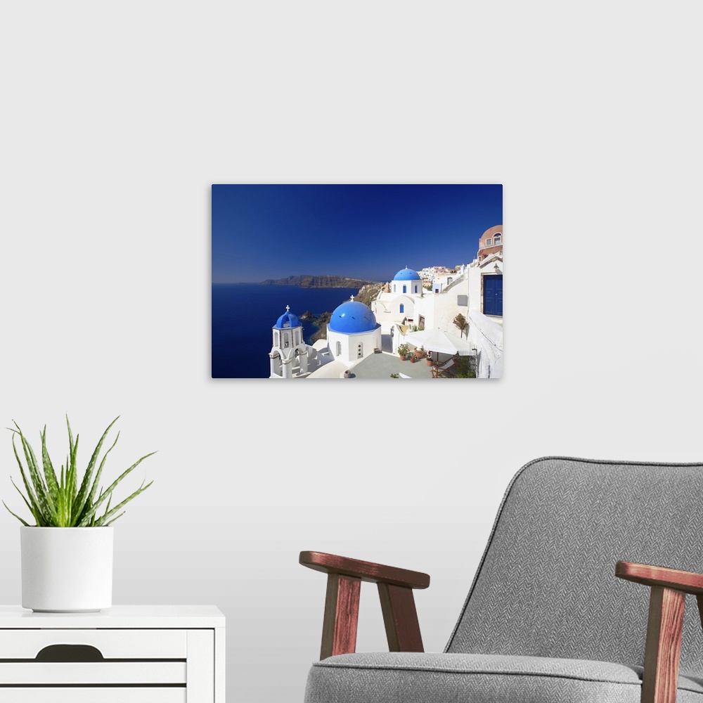 A modern room featuring Oia, Santorini, Cyclades, Greek Islands, Greece, Europe