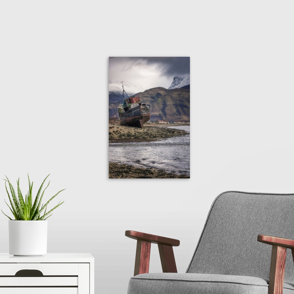 A modern room featuring Old boat wreck at Caol with Ben Nevis in the background, Scottish Highlands, Scotland, United Kin...