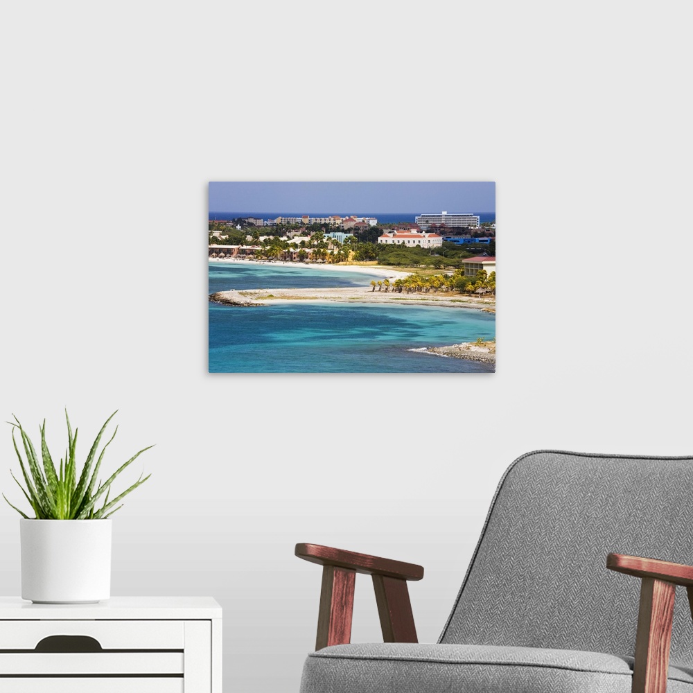 A modern room featuring Oranjestad City and coastline, Aruba, West Indies, Caribbean, Central America