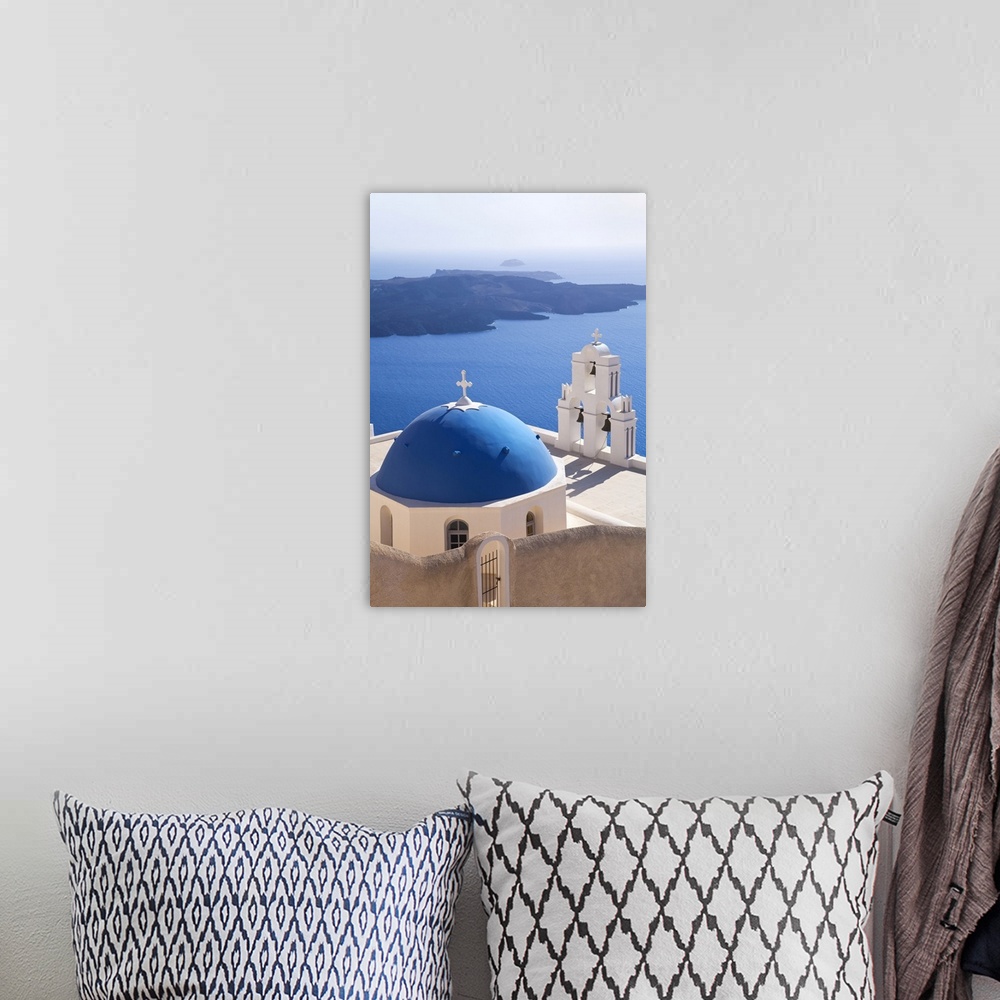 A bohemian room featuring Bell Tower of Orthodox Church overlooking the Caldera in Fira, Santorini (Thira), Cyclades Island...