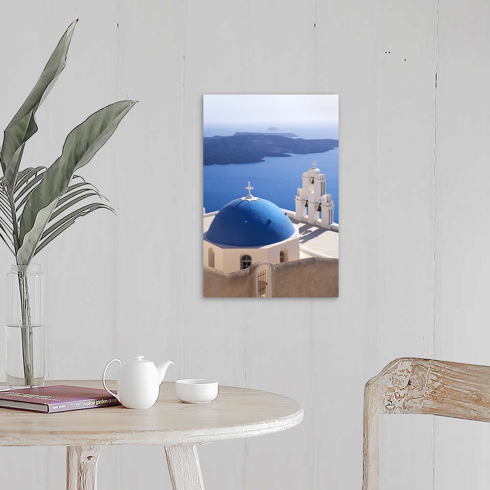 A farmhouse room featuring Bell Tower of Orthodox Church overlooking the Caldera in Fira, Santorini (Thira), Cyclades Island...