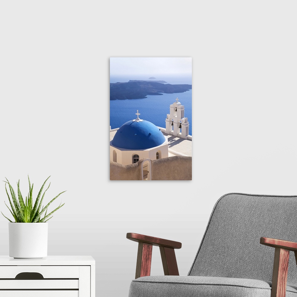 A modern room featuring Bell Tower of Orthodox Church overlooking the Caldera in Fira, Santorini (Thira), Cyclades Island...