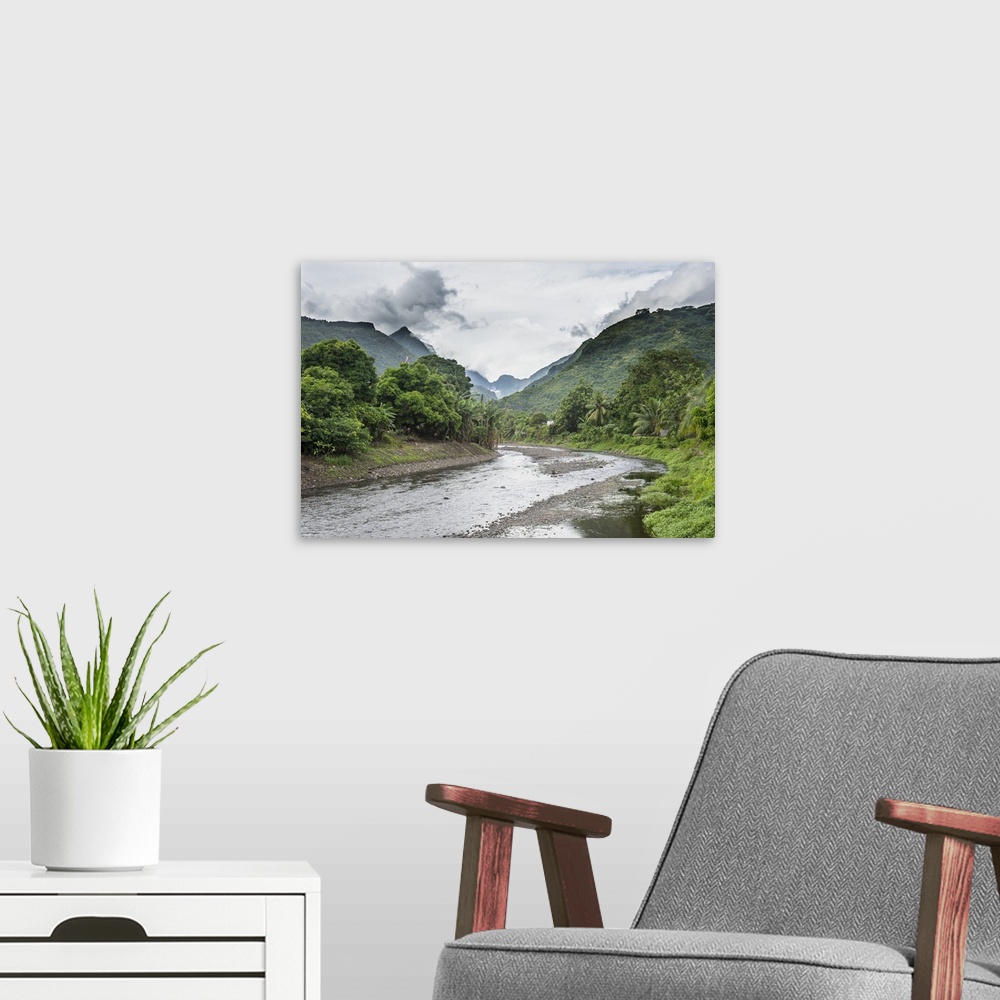 A modern room featuring Paea River with dramatic mountains in the background, Tahiti, Society Islands, French Polynesia