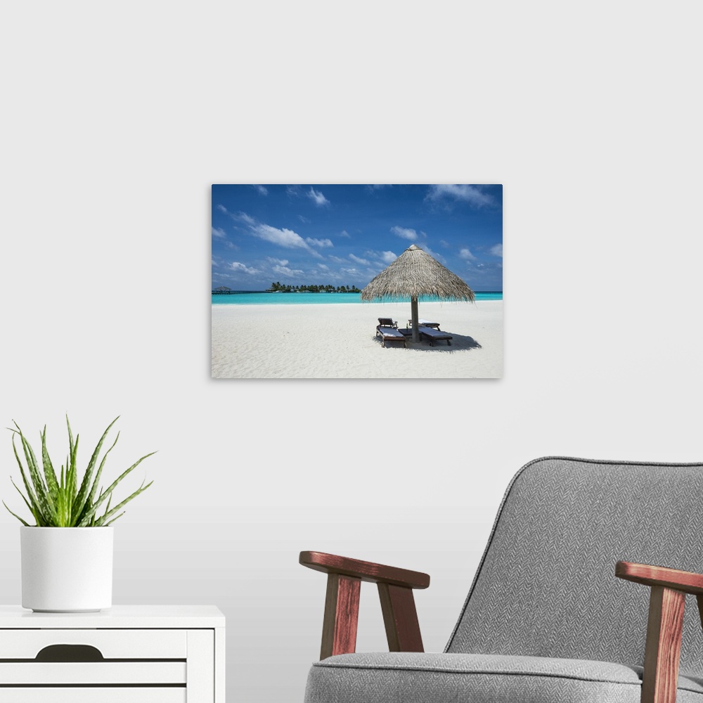 A modern room featuring Parasol on a white sand beach and turquoise water, Sun Island Resort, Nalaguraidhoo island, Ari a...