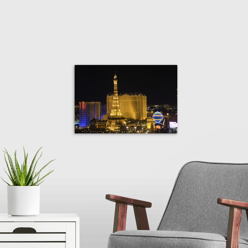 A modern room featuring Paris Hotel on the Strip (Las Vegas Boulevard) at night, Las Vegas, Nevada