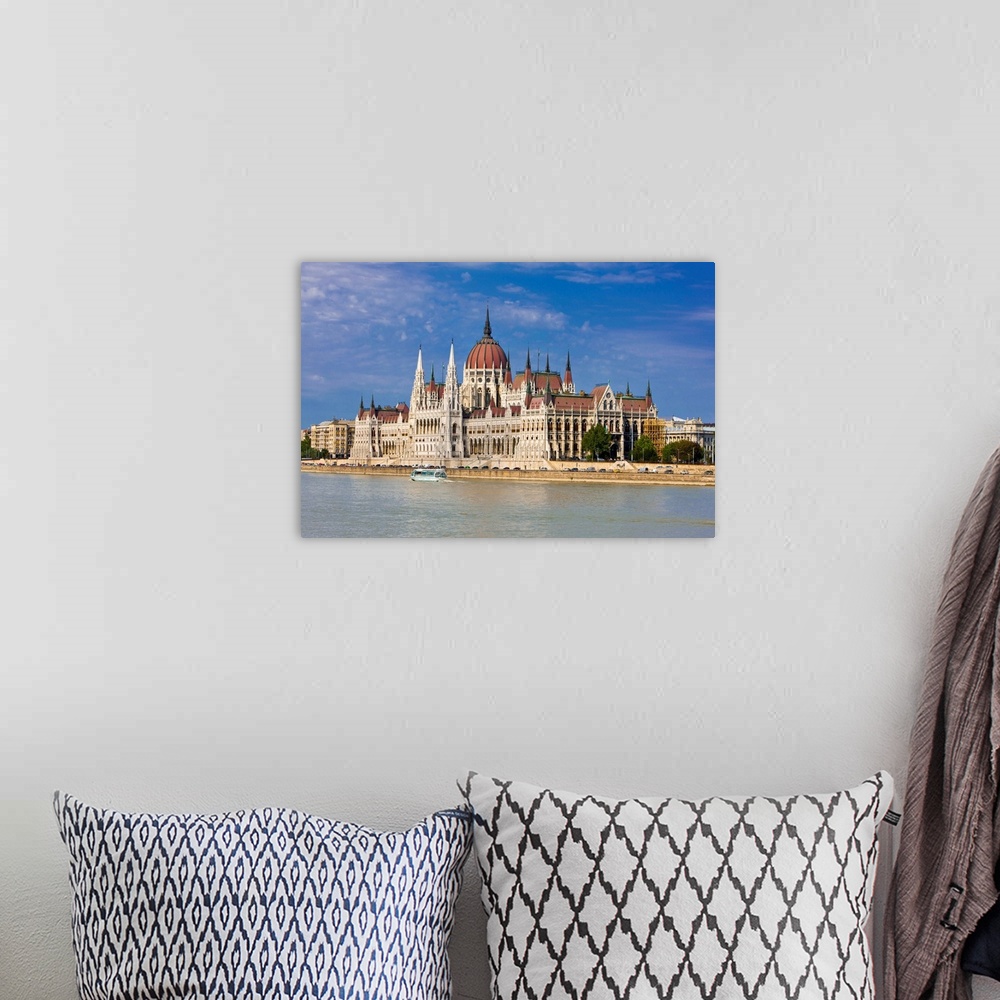 A bohemian room featuring Parliament on the banks of the River Danube, Budapest, Hungary, Europe
