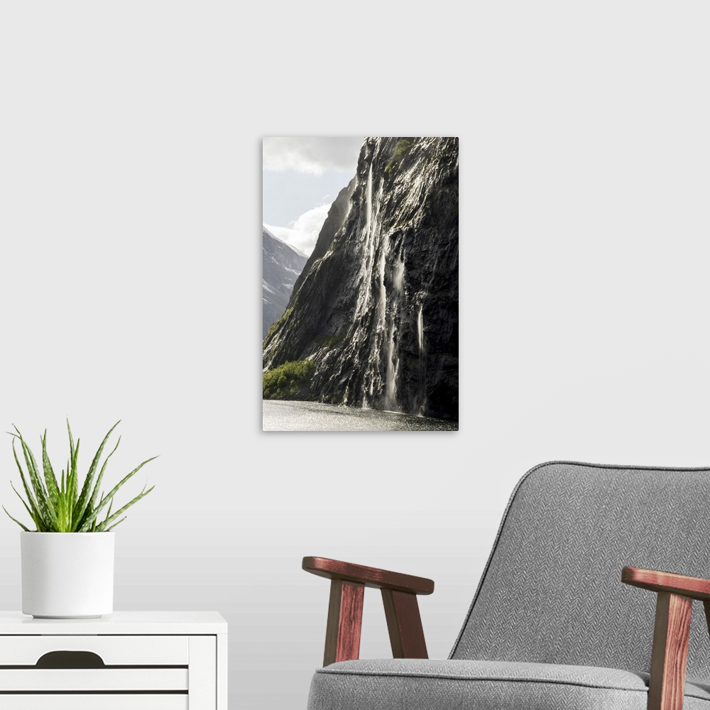 A modern room featuring Part of the Seven Sisters waterfall, Geiranger Fjord, UNESCO World Heritage Site, More og Romsdal...