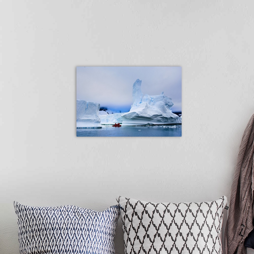 A bohemian room featuring Passengers exploring icebergs, Antarctica, Polar Regions