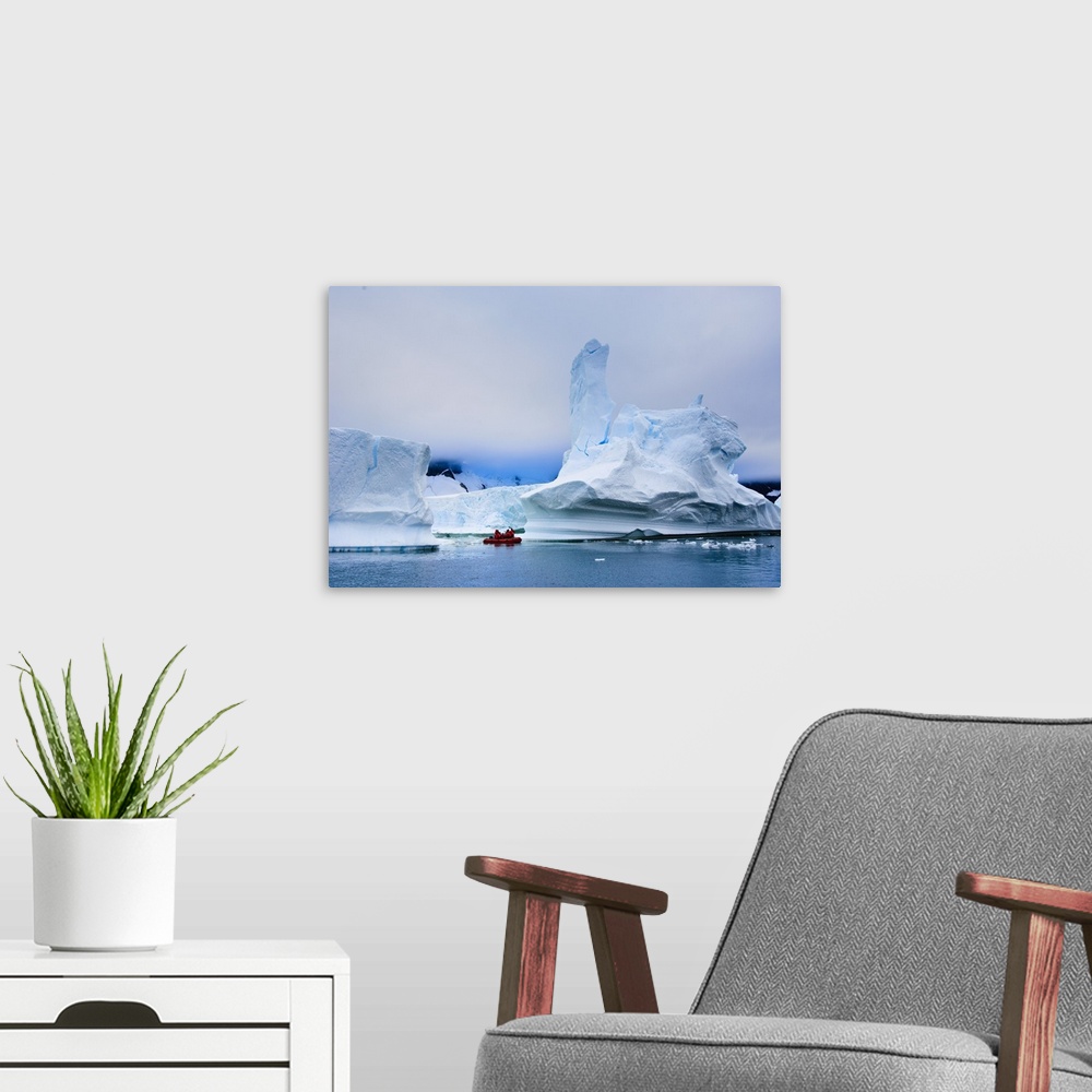 A modern room featuring Passengers exploring icebergs, Antarctica, Polar Regions
