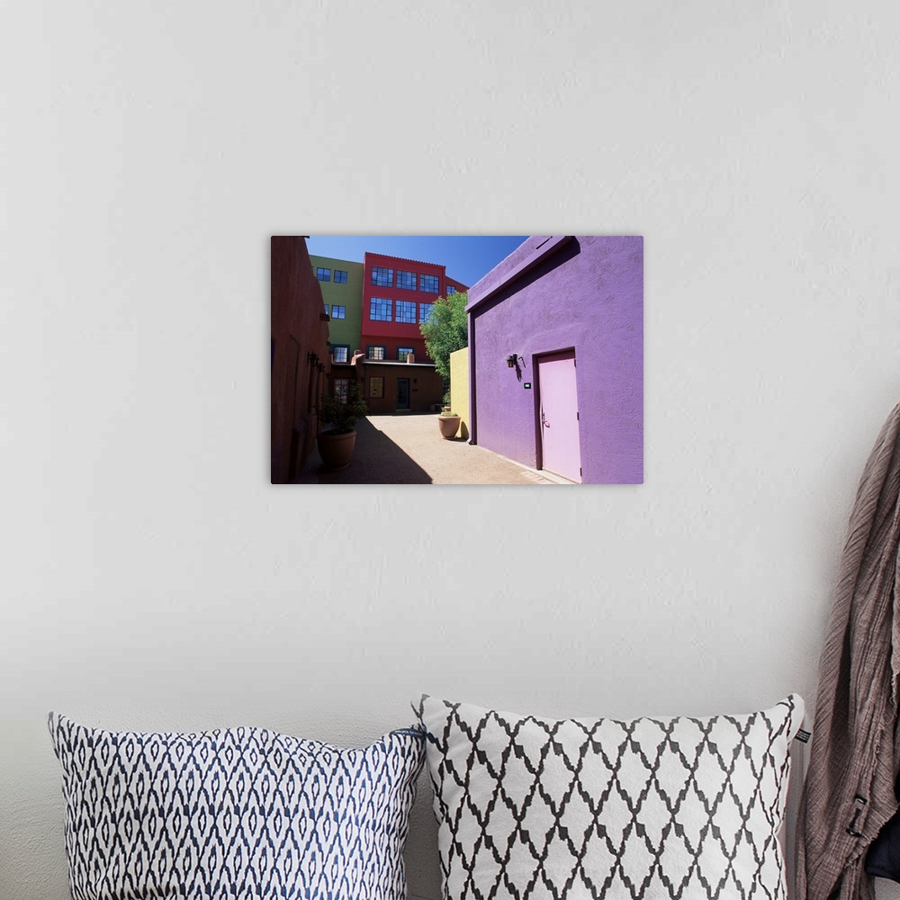 A bohemian room featuring Pastel coloured facades in the village, La Placita, Tucson, Arizona, USA