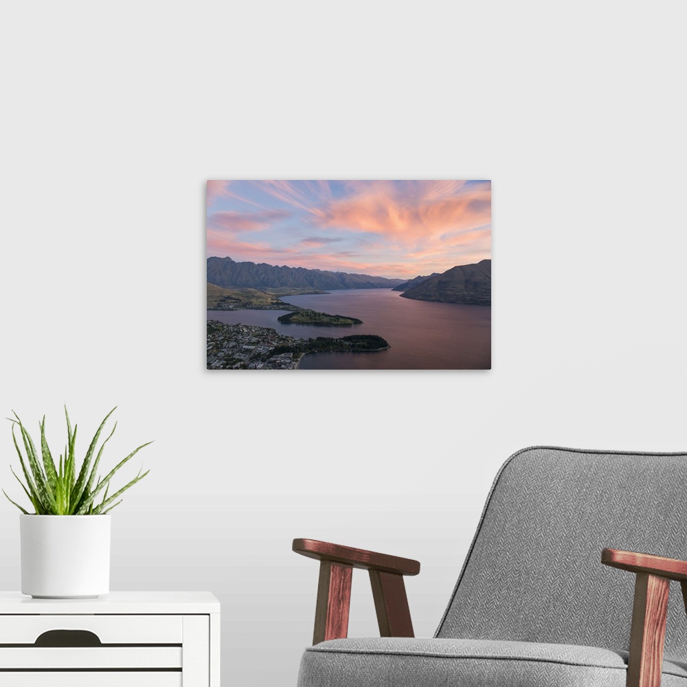 A modern room featuring Pink clouds over Lake Wakatipu and the Remarkables, dusk, Queenstown, Queenstown-Lakes district, ...