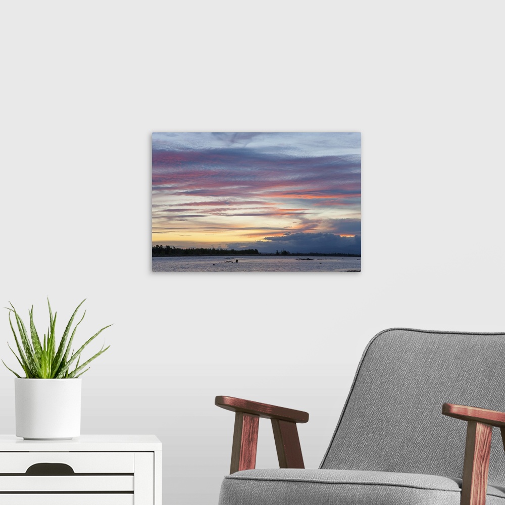 A modern room featuring Pink clouds over the Wairau River estuary at dusk, Wairau Bar, near Blenheim, Marlborough, South ...