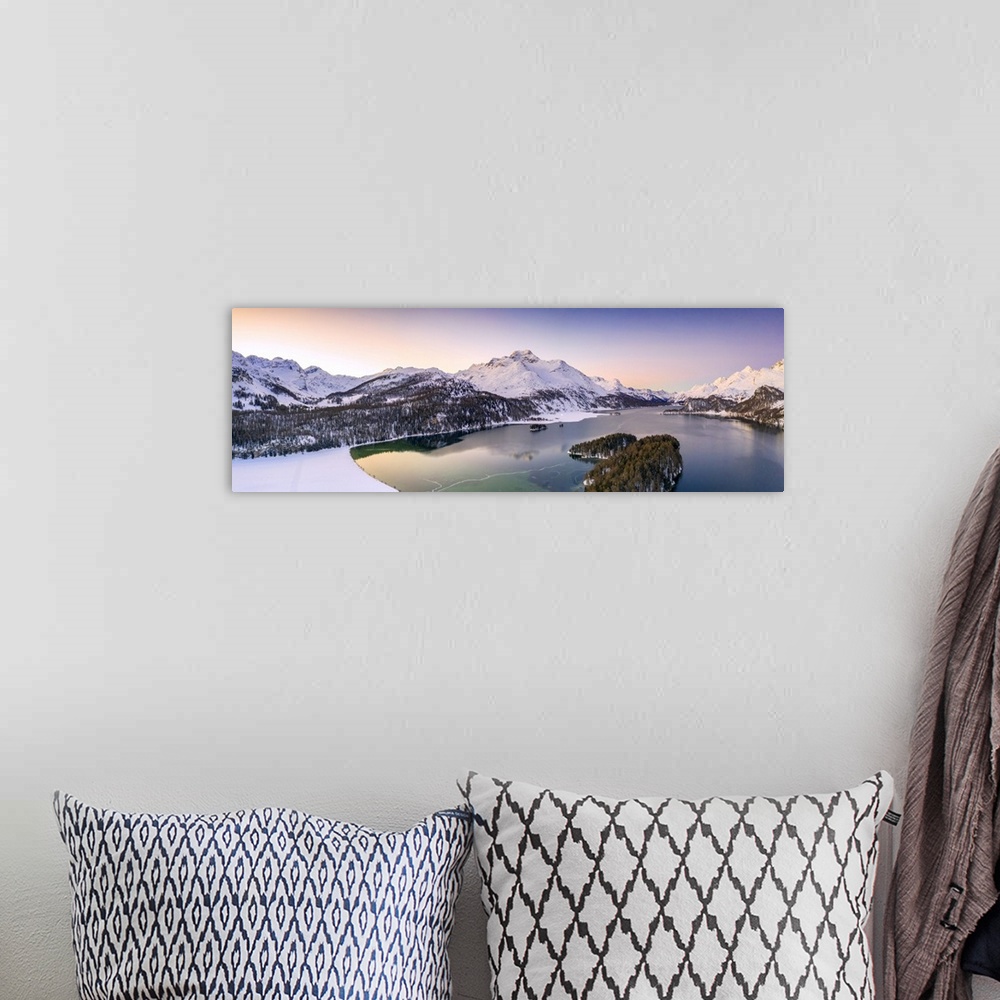 A bohemian room featuring Aerial panoramic of Piz Da La Margna and Lake Sils during a winter sunrise, Engadine, canton of G...