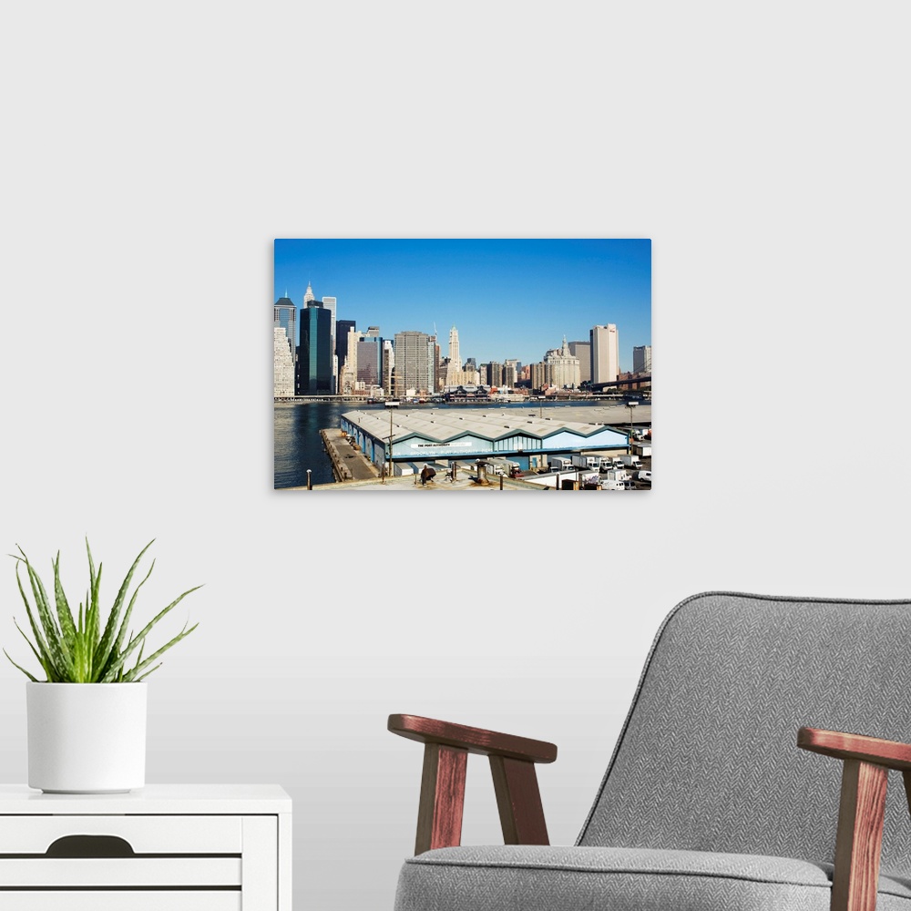 A modern room featuring Port Authority buildings on the Brooklyn side of the East River, NYC