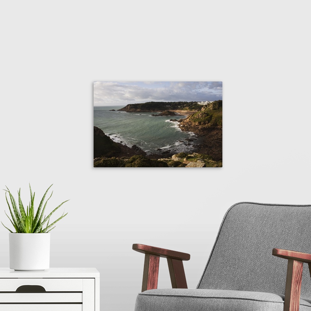 A modern room featuring Portelet Bay from Noirmont Point, Jersey, Channel Islands, United Kingdom, Europe