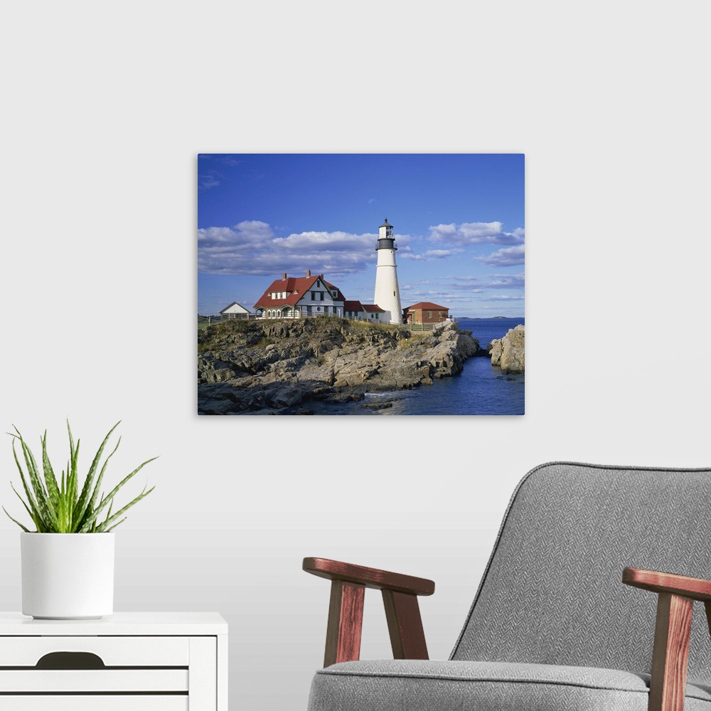 A modern room featuring Portland Head lighthouse on rocky coast at Cape Elizabeth, Maine, New England
