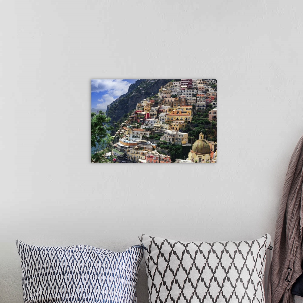 A bohemian room featuring Positano town hill view with low rise colorful buildings above the sea line, Positano, Amalfi Coa...