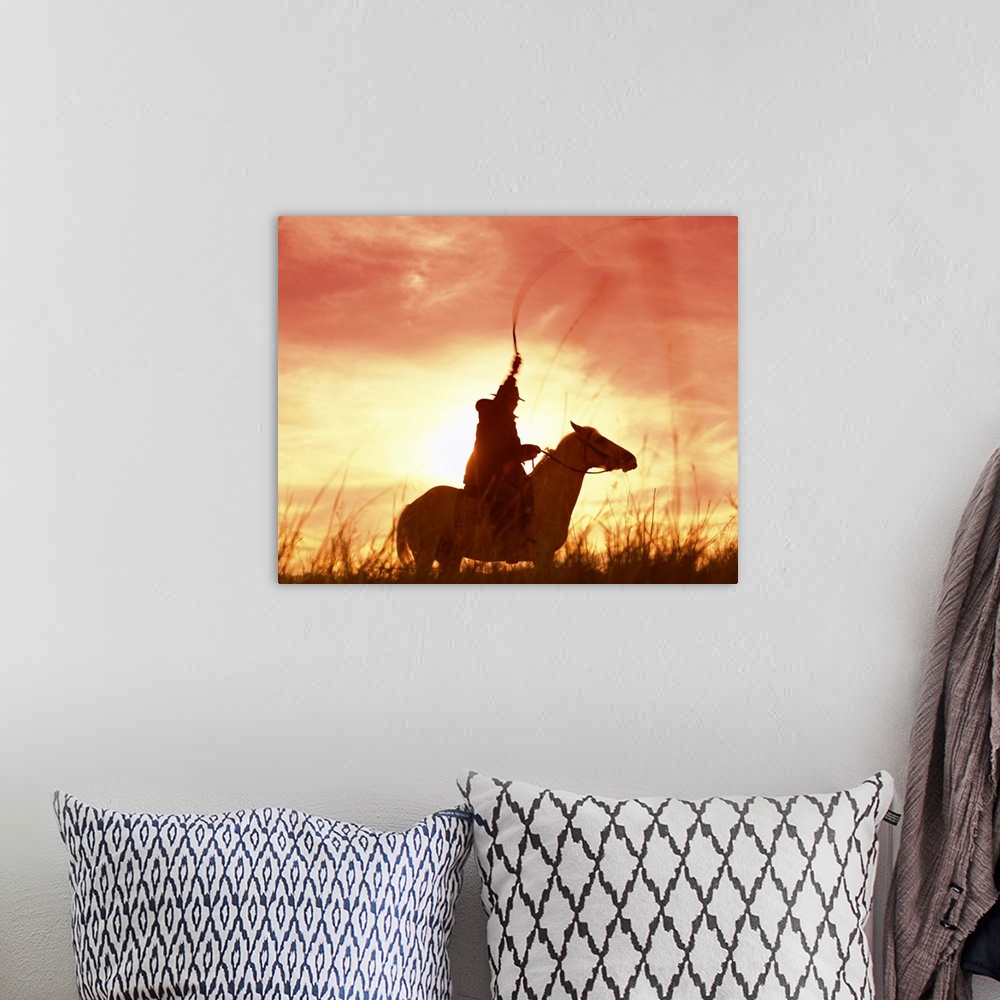 A bohemian room featuring Profile of a stockman on a horse against the sunset, Queensland, Australia, Pacific