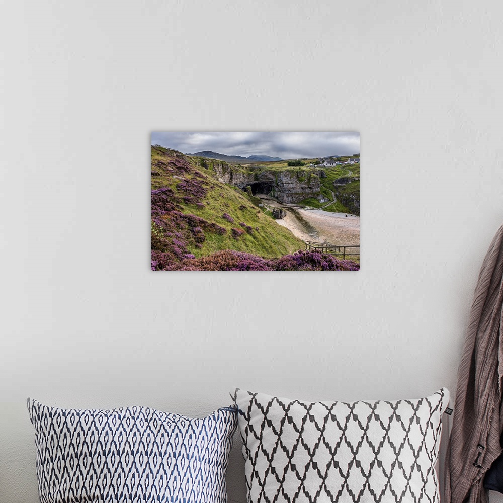 A bohemian room featuring Purple heather on the cliffs above Smoo Cave near Durness which has one of the largest sea cave e...