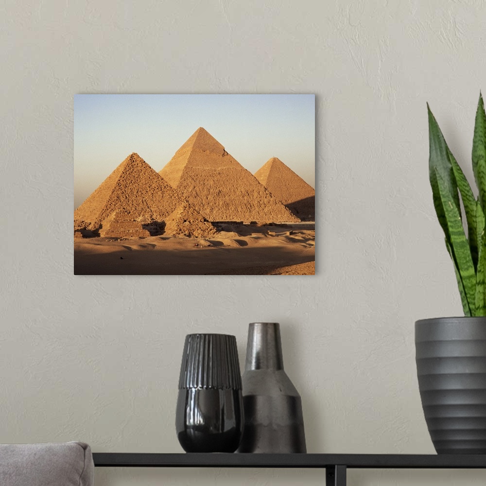 A modern room featuring Pyramids at sunset, Giza, Egypt, North Africa, Africa