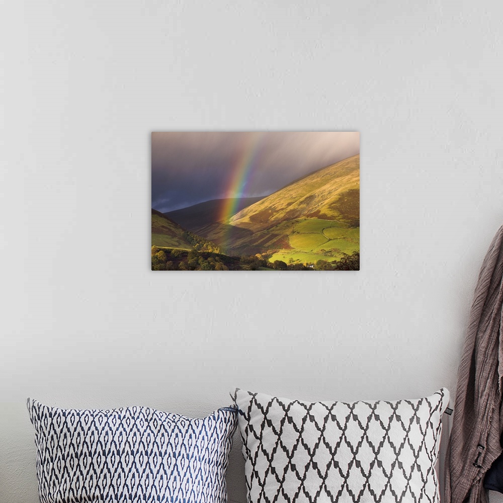 A bohemian room featuring Rainbow on the foothills of Blencathra on a showery autumn afternoon, Lake District National Park...