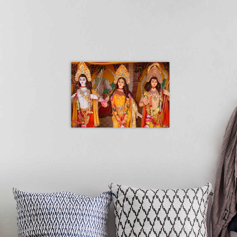 A bohemian room featuring Rama, Sita and Rama again, Goverdan, Uttar Pradesh, India, Asia.