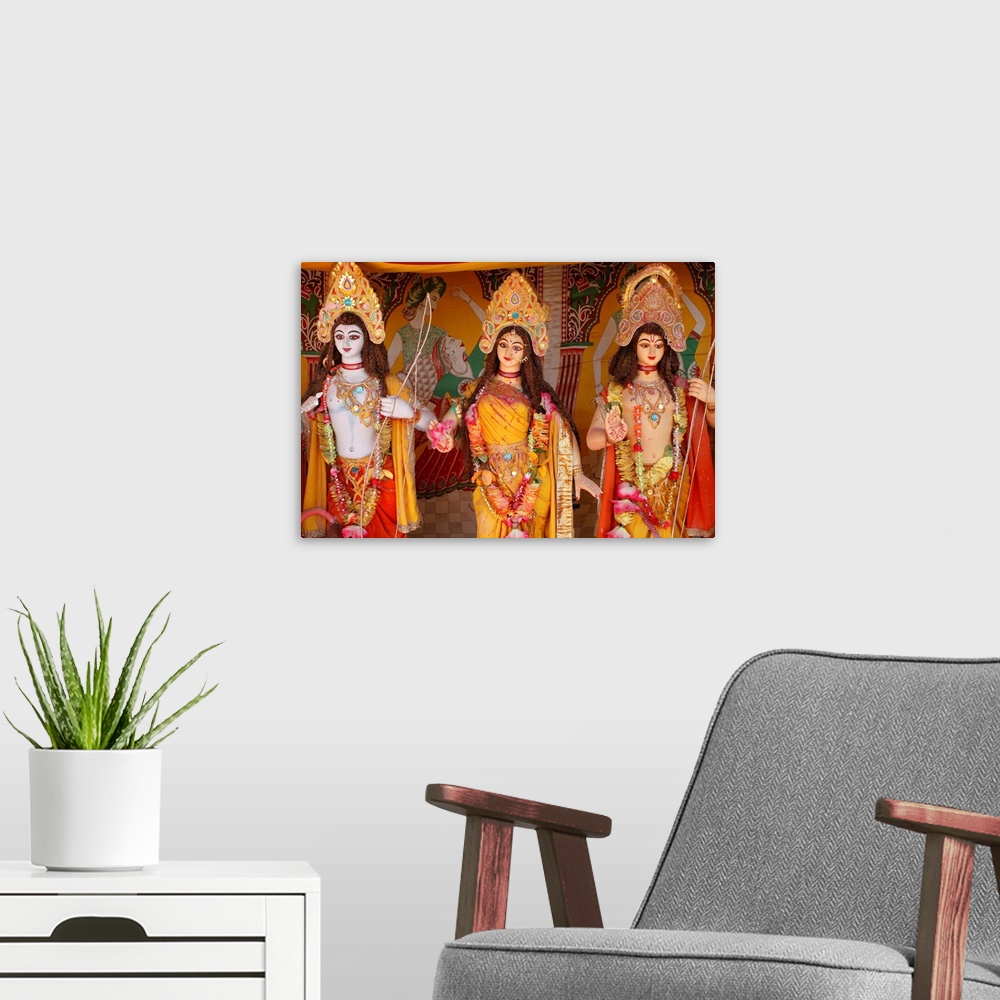 A modern room featuring Rama, Sita and Rama again, Goverdan, Uttar Pradesh, India, Asia.