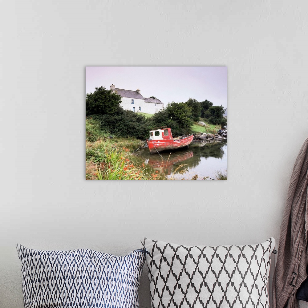 A bohemian room featuring Red boat and house, Ballycrovane, County Cork, Munster, Republic of Ireland (Eire)