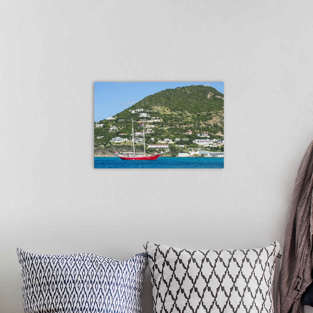 A bohemian room featuring Red sailing boat in the bay of Philipsburg, Sint Maarten, West Indies, Caribbean