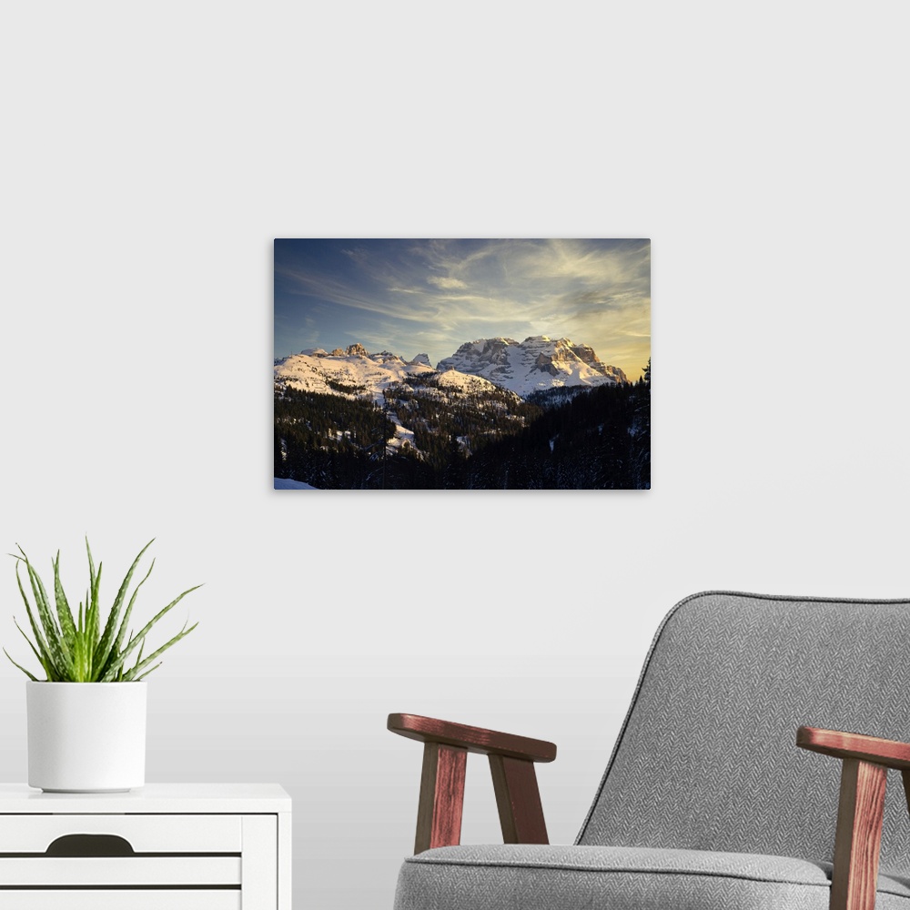 A modern room featuring Rendena Valley, Brenta mountain range at sunset in winter, Trentino, Dolomites, Italy, Europe