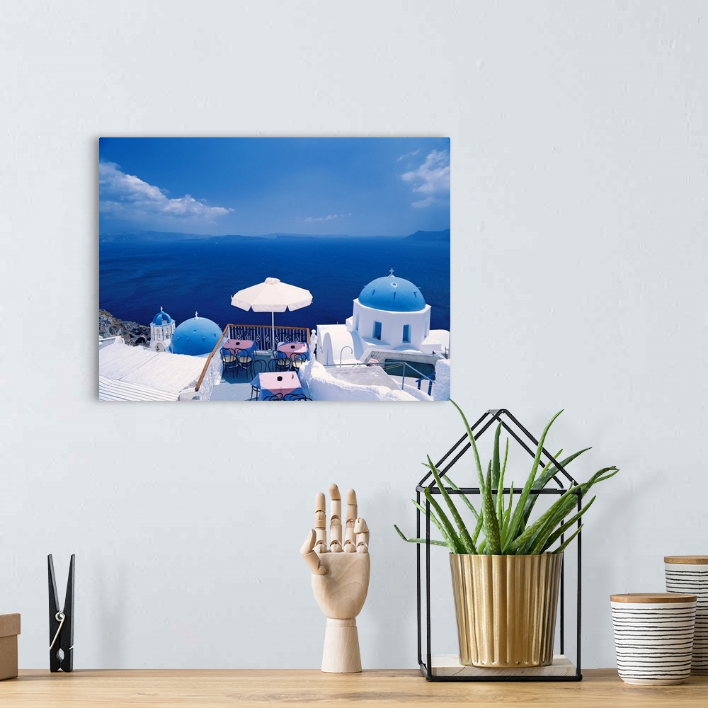 A bohemian room featuring Restaurant by ocean, Oia, Santorini, Cyclades, Greek Islands, Greece, Europe
