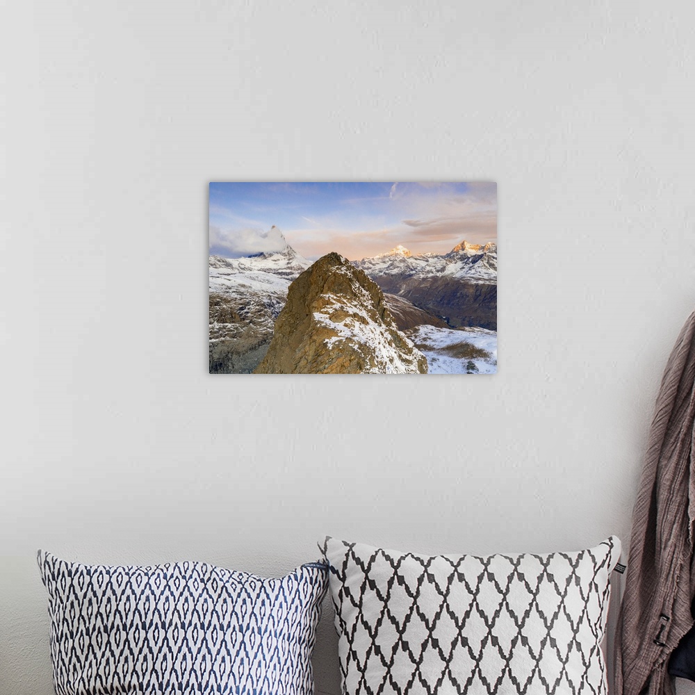 A bohemian room featuring Aerial view of Riffelhorn ridge, Matterhorn and Dent Blanche at sunrise, Zermatt, canton of Valai...