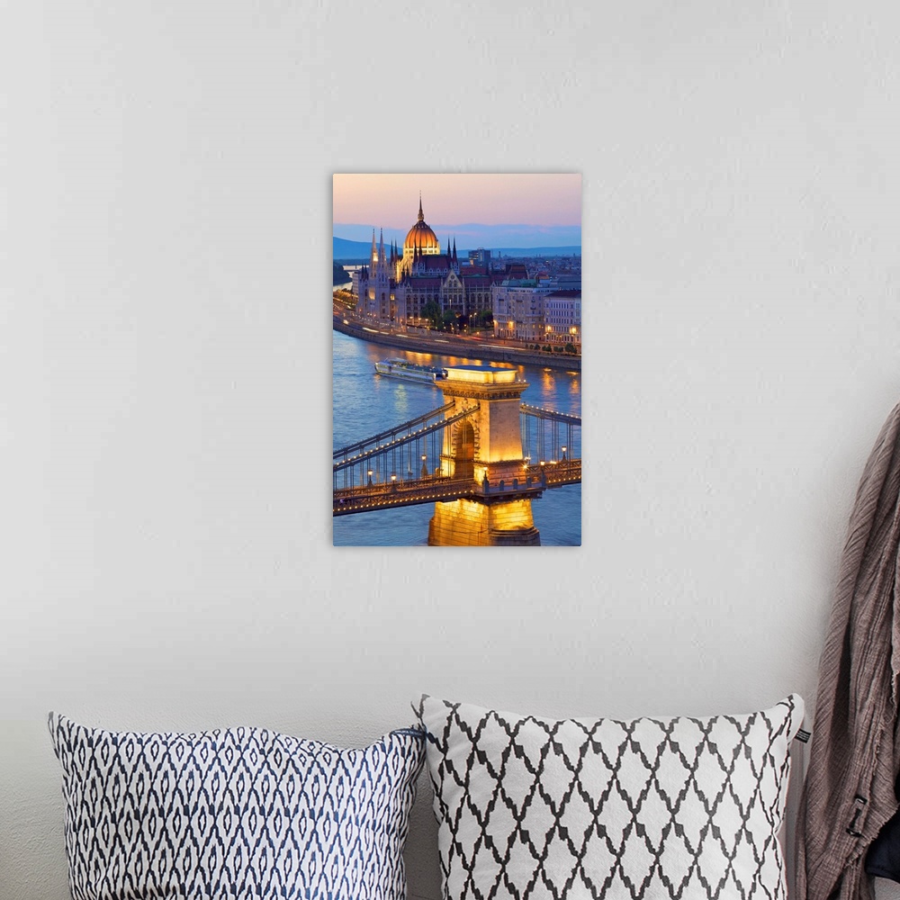 A bohemian room featuring River Danube and Hungarian Parliament at dusk, Budapest, Hungary