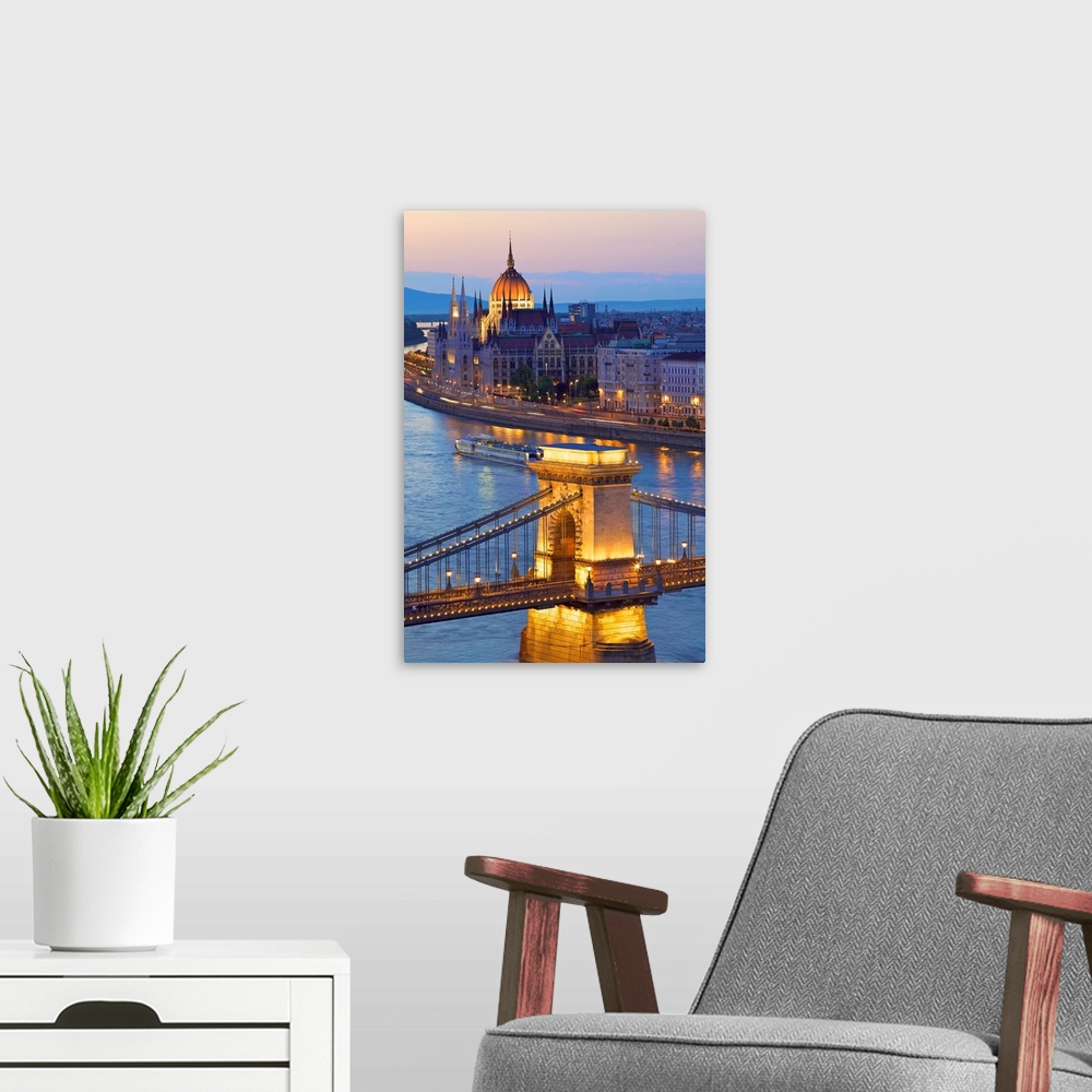 A modern room featuring River Danube and Hungarian Parliament at dusk, Budapest, Hungary