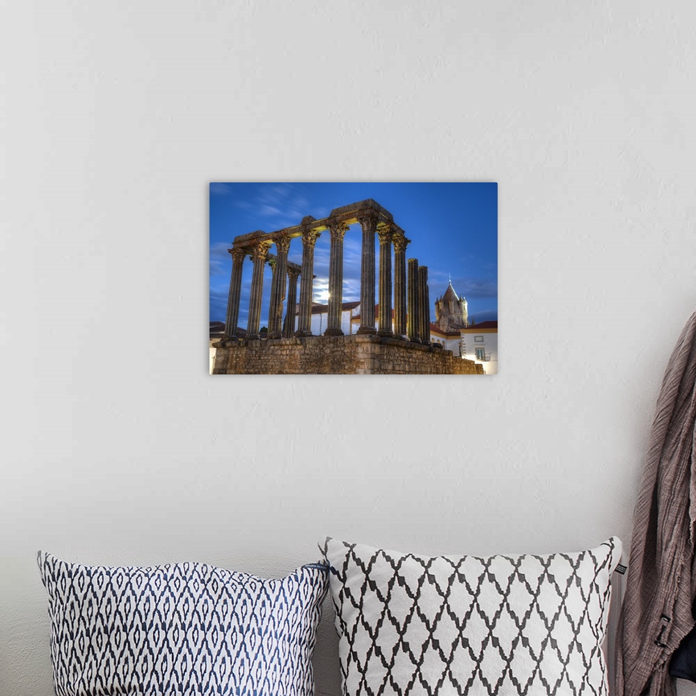 A bohemian room featuring Roman Temple in foreground, Evora Cathdral in the background, Evora, UNESCO World Heritage Site, ...
