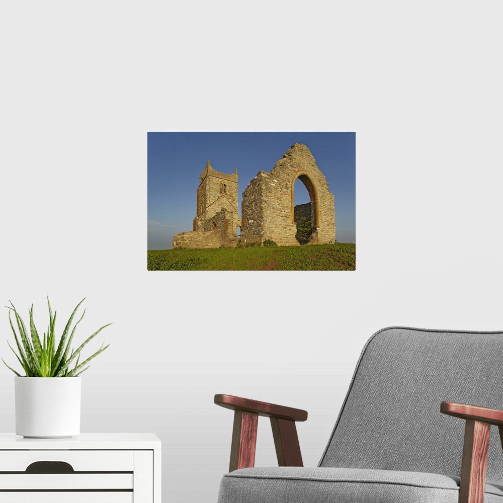 A modern room featuring The ruins of St. Michael's Church on the summit of Burrow Mump, a small hill at Burrowbridge, in ...