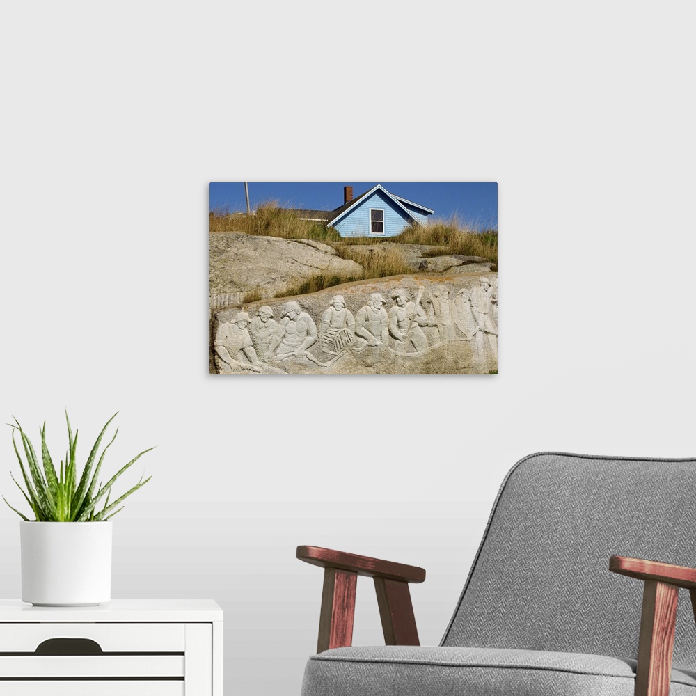 A modern room featuring Sculpture of residents carved onto rock, at Peggys Cove, Nova Scotia, Canada