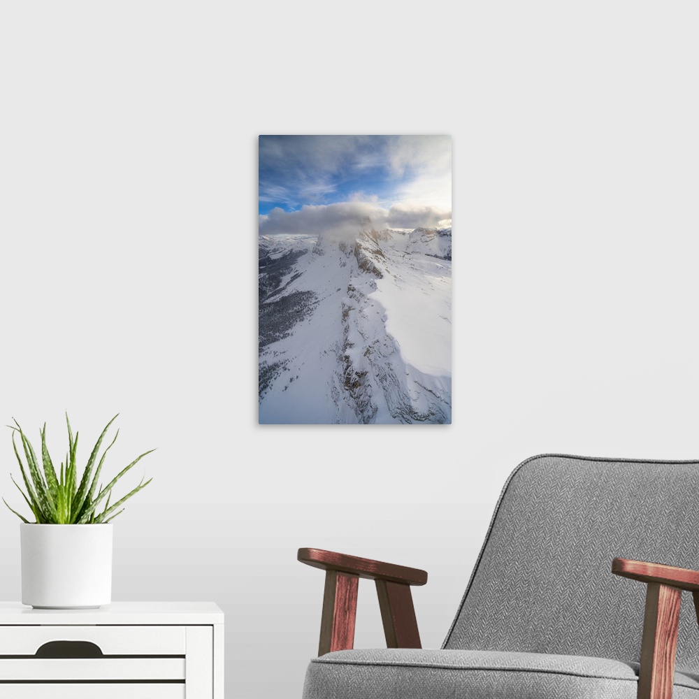 A modern room featuring Seceda and Odle mountain range in winter, aerial view, Val Gardena, Dolomites, Trentino-Alto Adig...