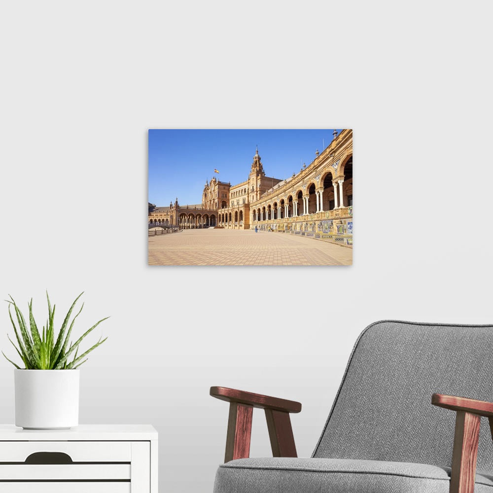 A modern room featuring Seville Plaza de Espana with ceramic tiled alcoves and arches, Maria Luisa Park, Seville, Andalus...
