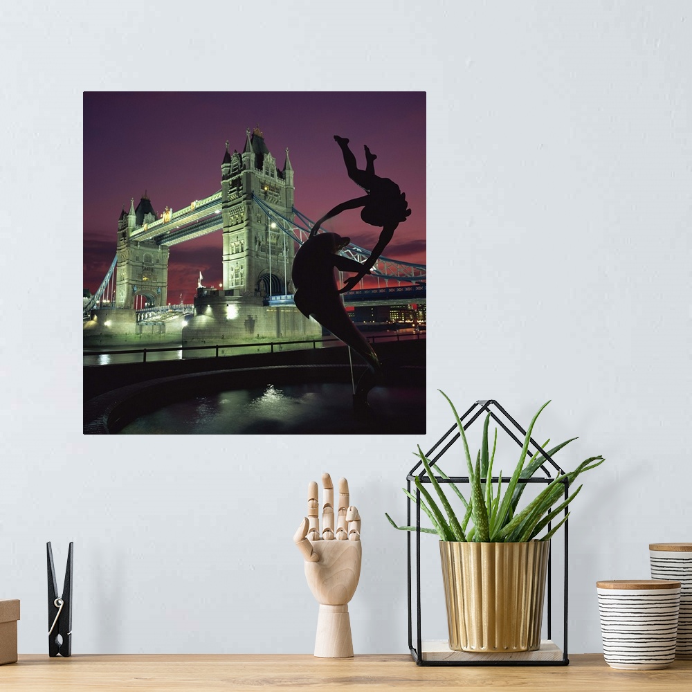 A bohemian room featuring Silhouetted fountain statue and Tower Bridge, London, England, UK