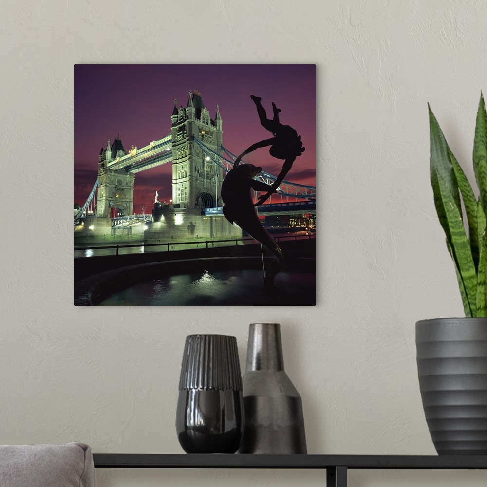 A modern room featuring Silhouetted fountain statue and Tower Bridge, London, England, UK