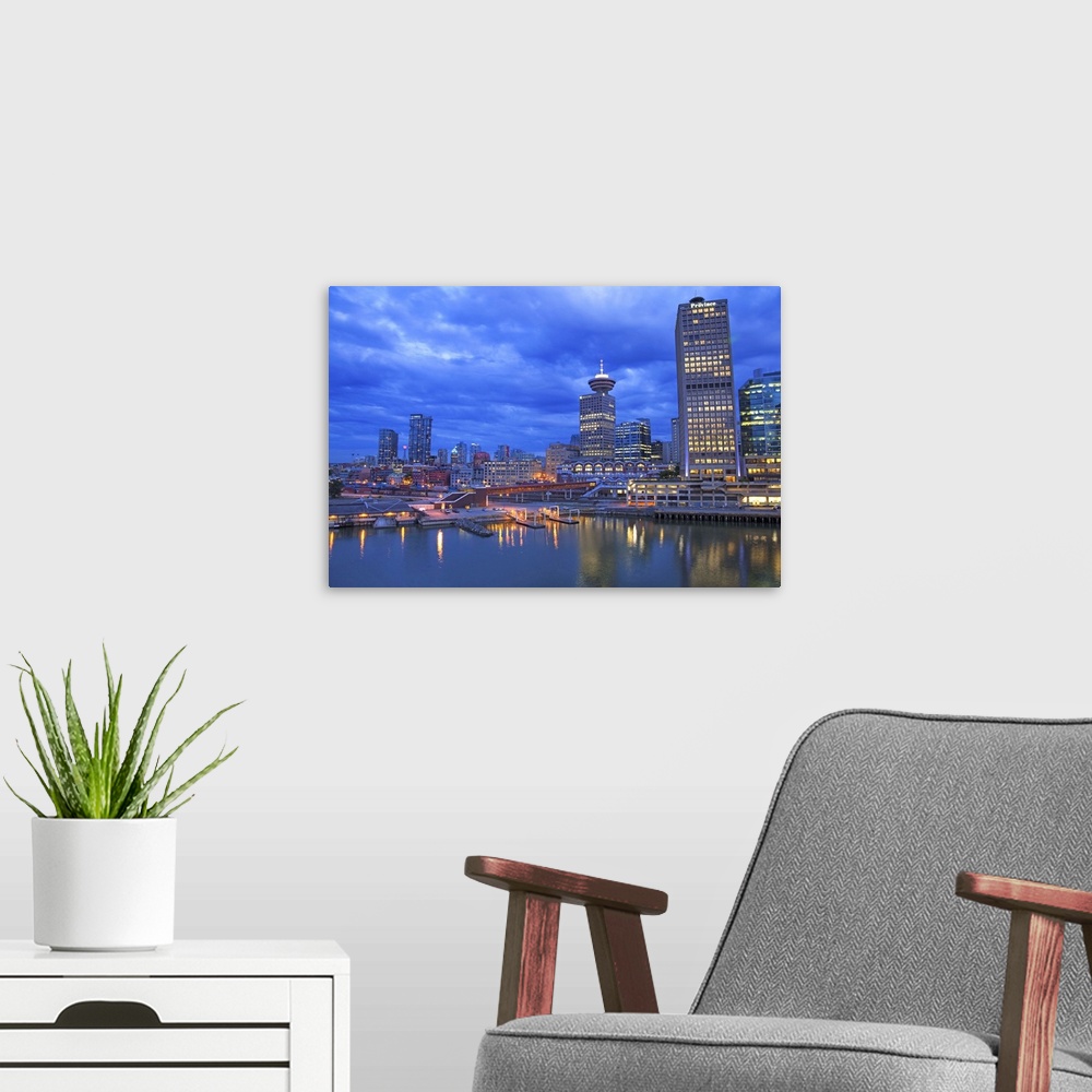 A modern room featuring Skyline and the waterfront in the evening, Vancouver, Canada